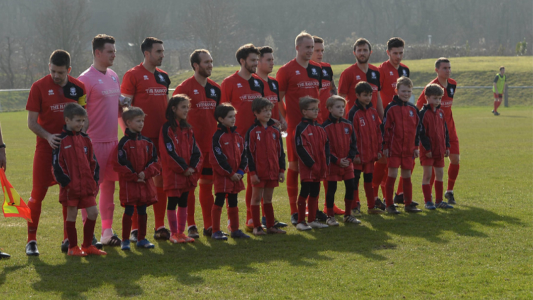 Hassocks players with members of the Junior squad who were mascots for the Southern Combination League Premier Division game with Horsham YMCA