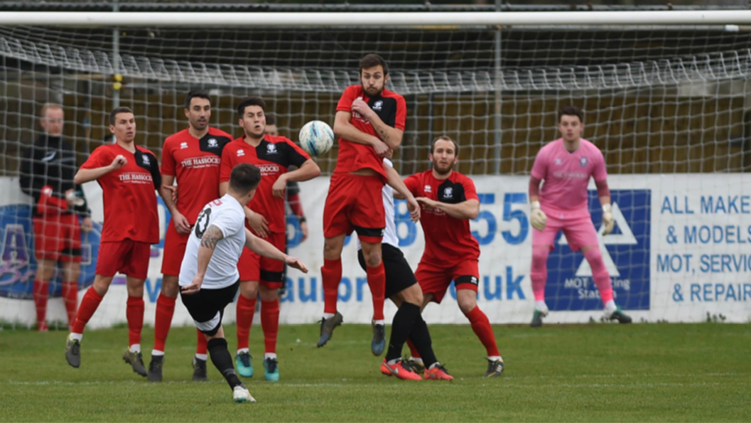 Hassocks defend a free kick against Pagham in their Southern Combination League Premier Division game