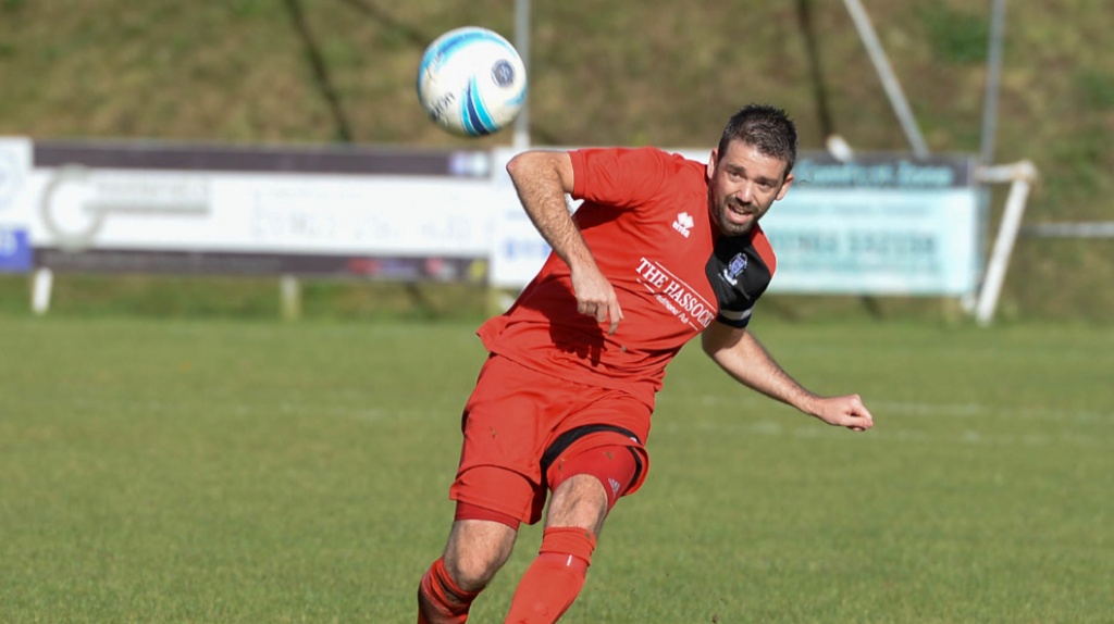 Ashley Marsh plays a forward pass for Hassocks