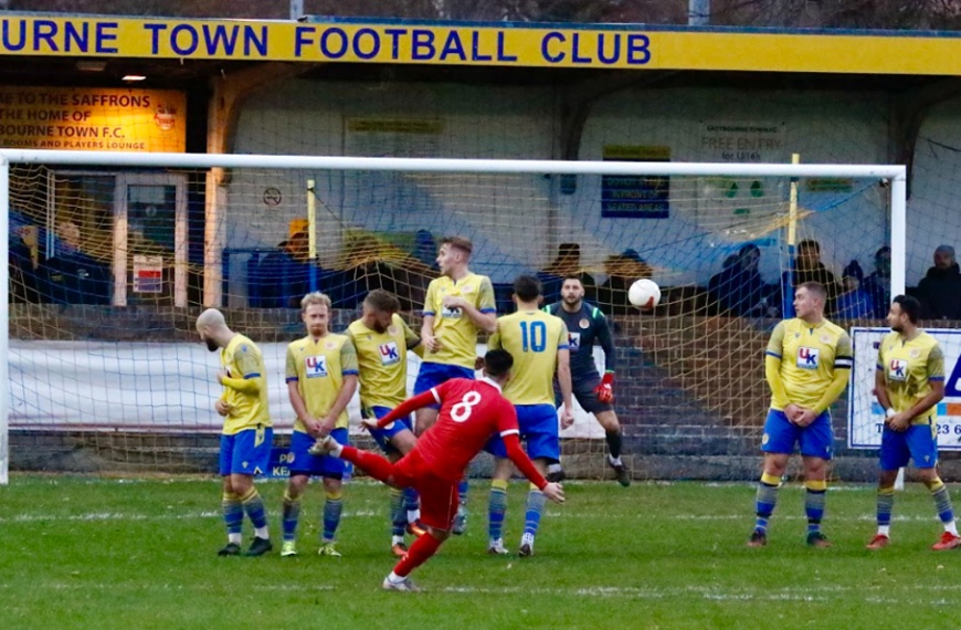 Lewis Westlake scoring a free-kick for Hassocks against Eastbourne Town