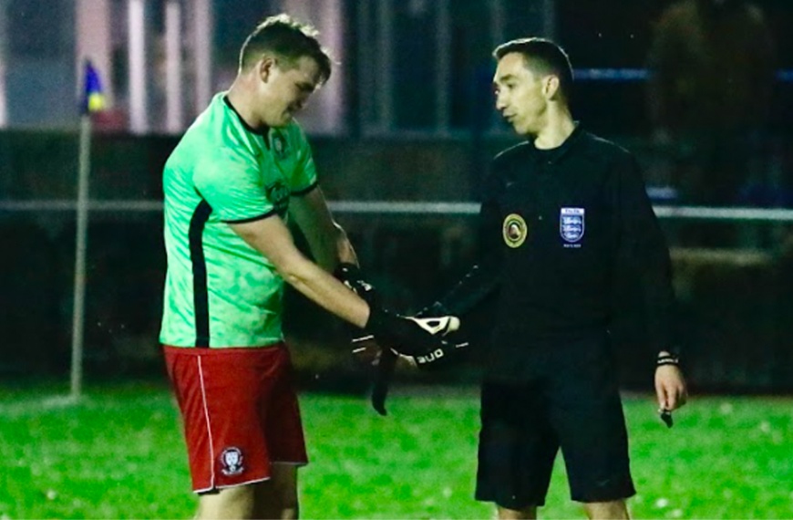 Hassocks defender Dan Turner taking over in goal as the Robins lost away at Eastbourne Town