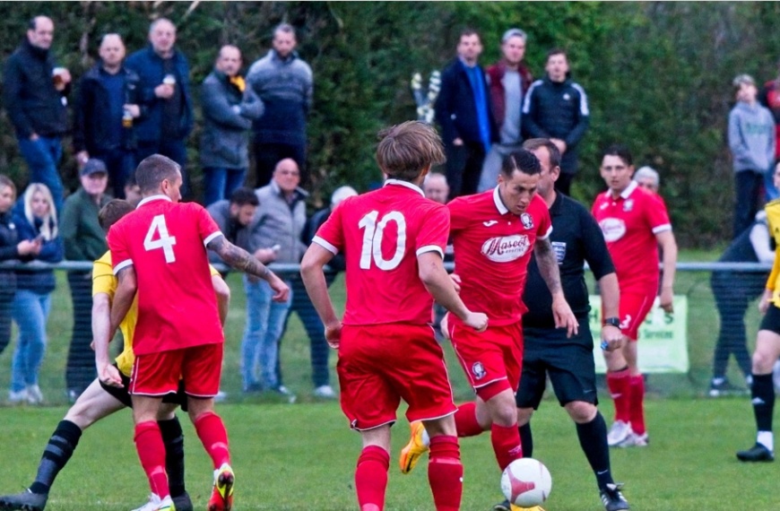 A big crowd watches on at the Beacon as Hassocks host Littlehampton Town