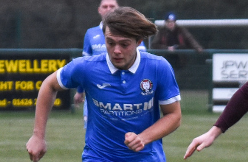 Hassocks forward Alfie Loversidge playing for the Robins against Little Common