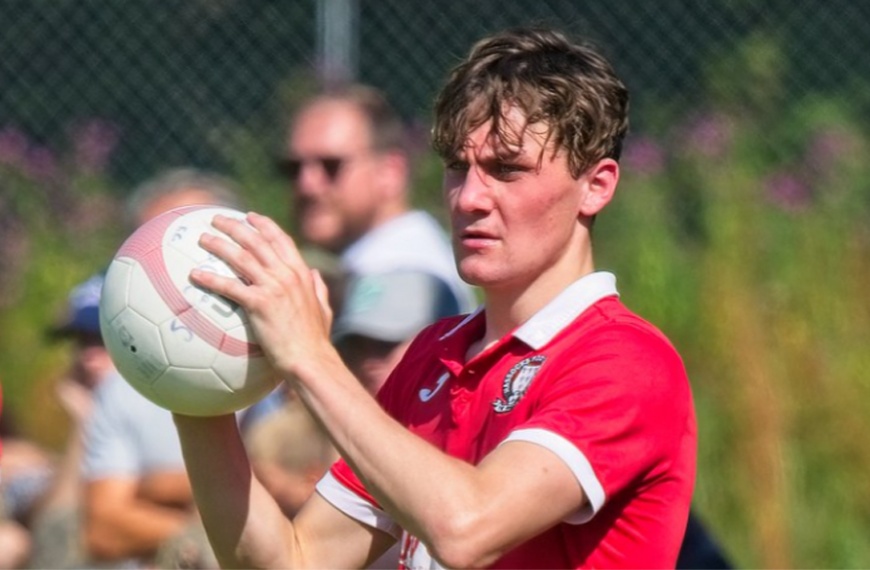 Hassocks winger Jack Troak takes a throw