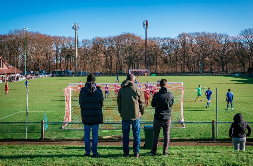 Hassocks fans watching the Robins in action from the West End bank at the Beacon