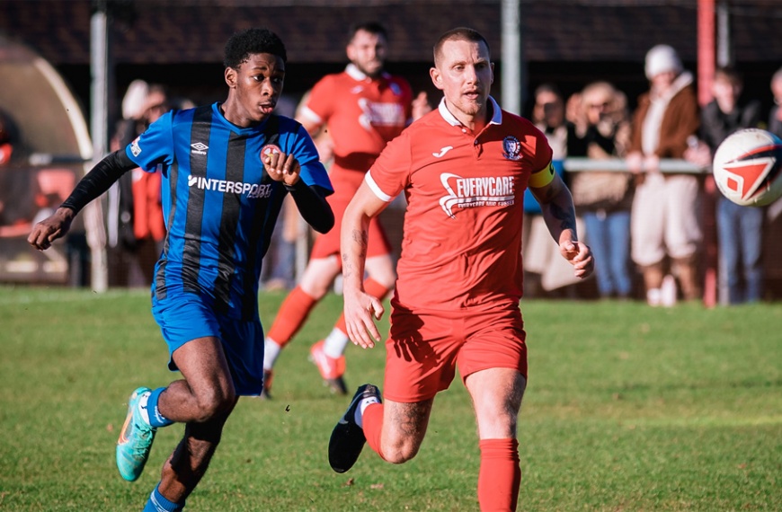 Alex Bygraves in action for Hassocks against Steyning Town on Boxing Day 2022