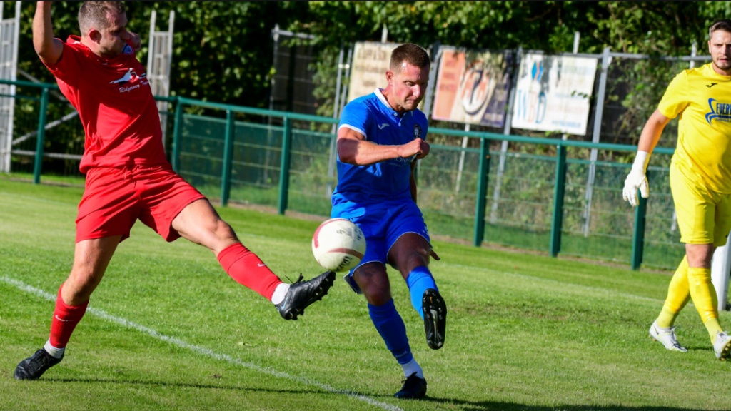 Alex Bygraves clears for Hassocks against Crawley Down Gatwick