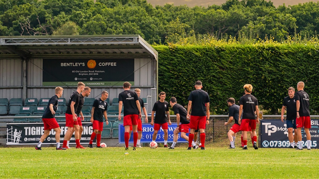 Hassocks warm up before their FA Cup game against Uxbridge at the Beacon
