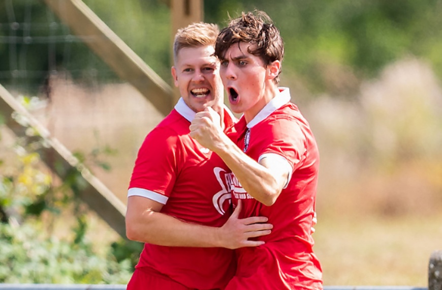 Phil Johnson and Jack Troak celebrate Hassocks scoring in the FA Cup against Uxbridge