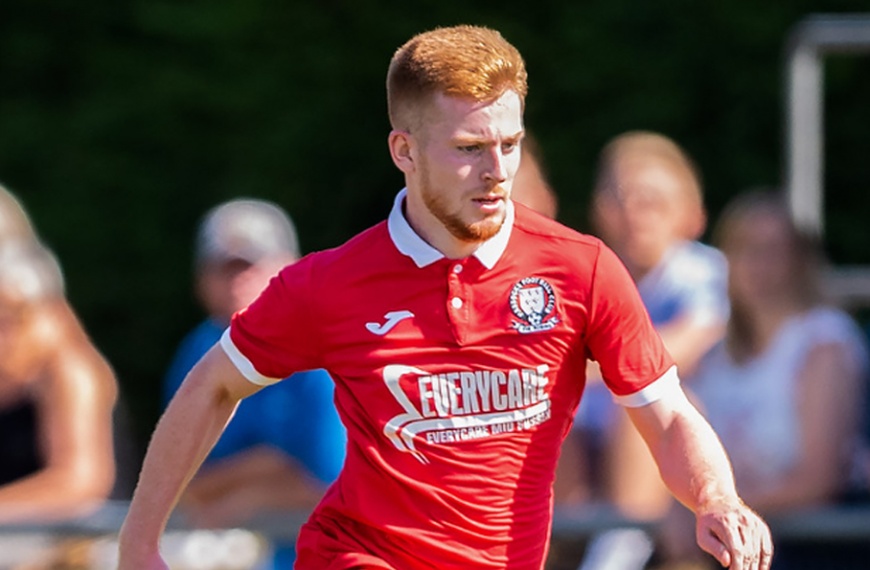 Joe Bull in action for Hassocks in their FA Cup clash with Uxbridge