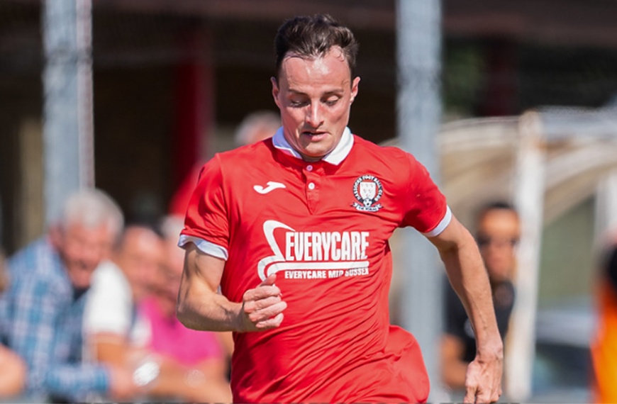 Hassocks full back Harvey Blake in action against Uxbridge in the FA Cup