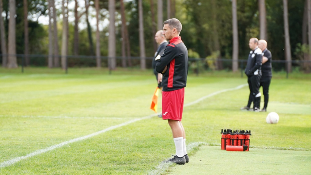 Hassocks head coach James Westlake watches his side in action against Loxwood