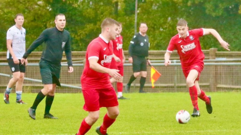 Jamie Wilkes on the ball for Hassocks against Bexhill United
