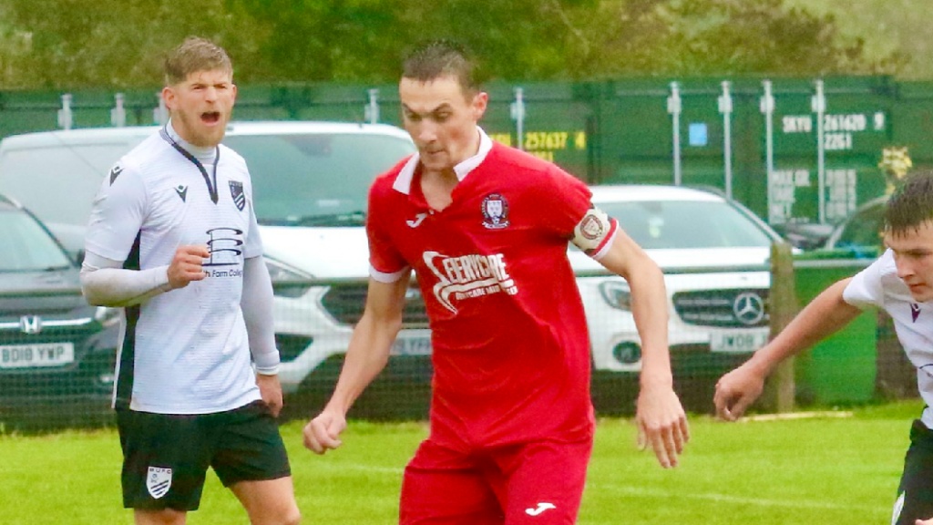 Hassocks captain Jack Troak playing against Bexhill United