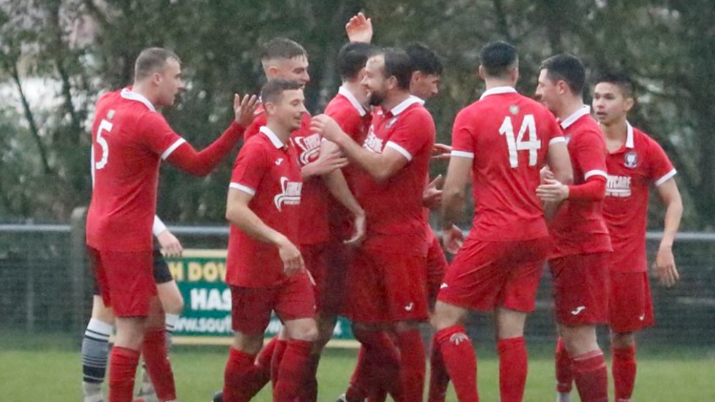 Hassocks celebrate their second goal of the game against Bexhill United