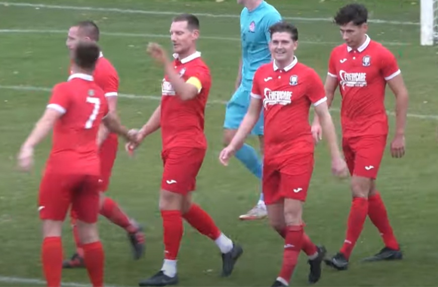 Hassocks celebrate Alex Bygraves scoring the fifth goal in their 5-1 rout of Saltdean United
