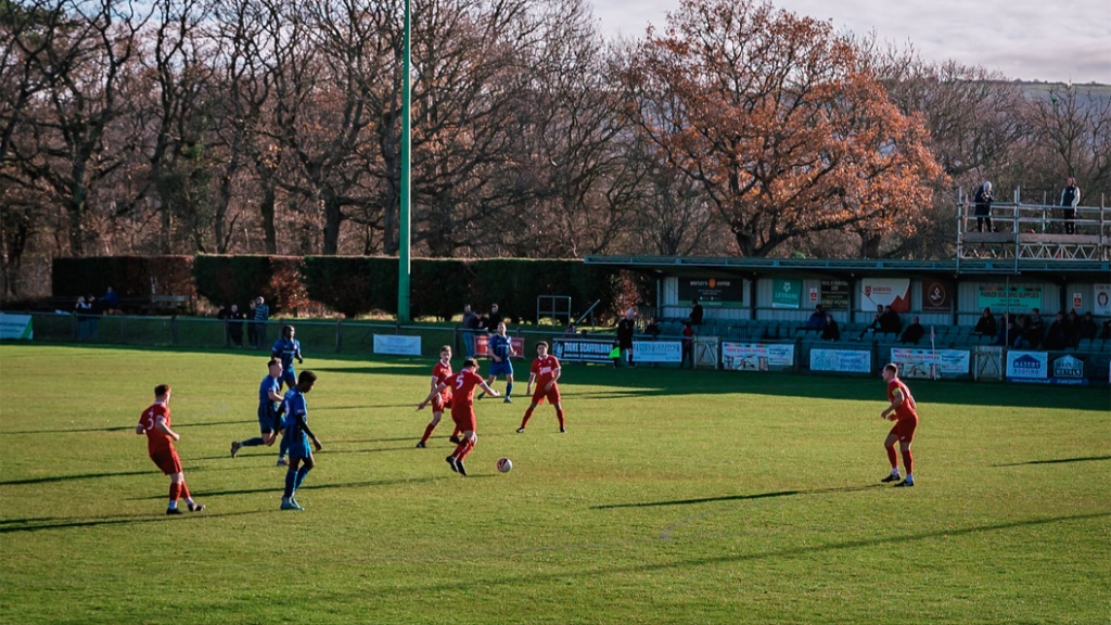 Hassocks have the ball during their Southern Combination League game  against Steyning Town