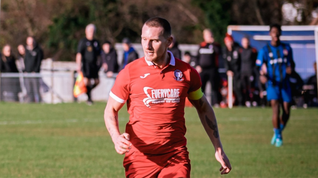 Hassocks captain Alex Bygraves playing against Steyning Town