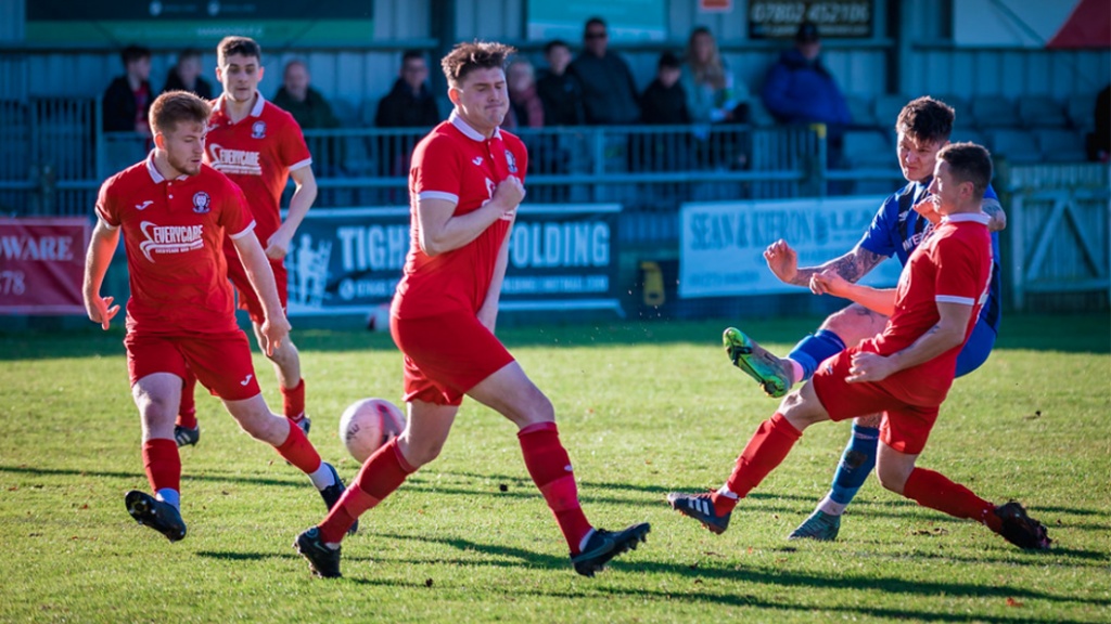 Hassocks defend in their Boxing Day game against Steyning Town