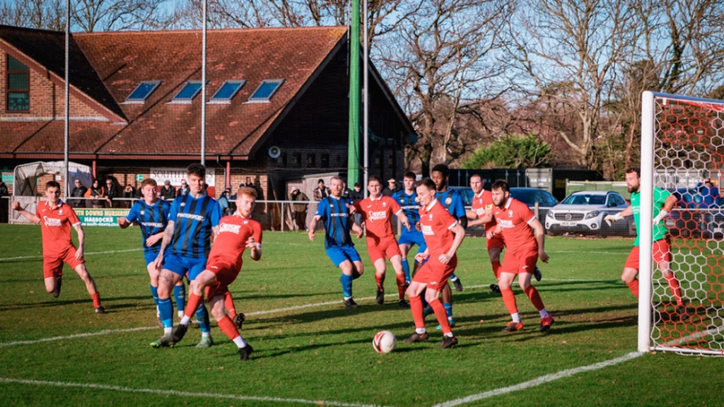 Hassocks defend against Steyning Town on Boxing Day 2022