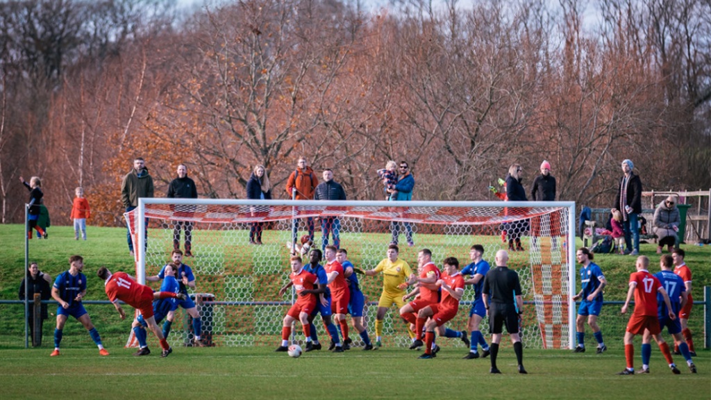 Hassocks attack with a corner against Steyning Town on Boxing Day