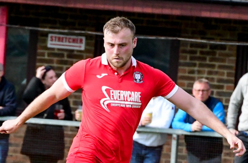 Hassocks defender Sam Smith playing against Crawley Down Gatwick