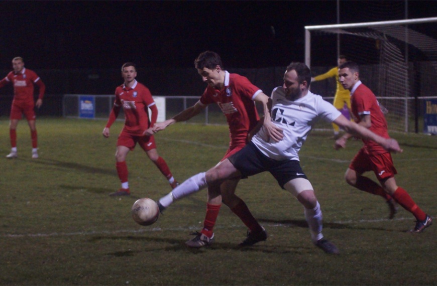 Hassocks playing against Eastbourne United in March 2023