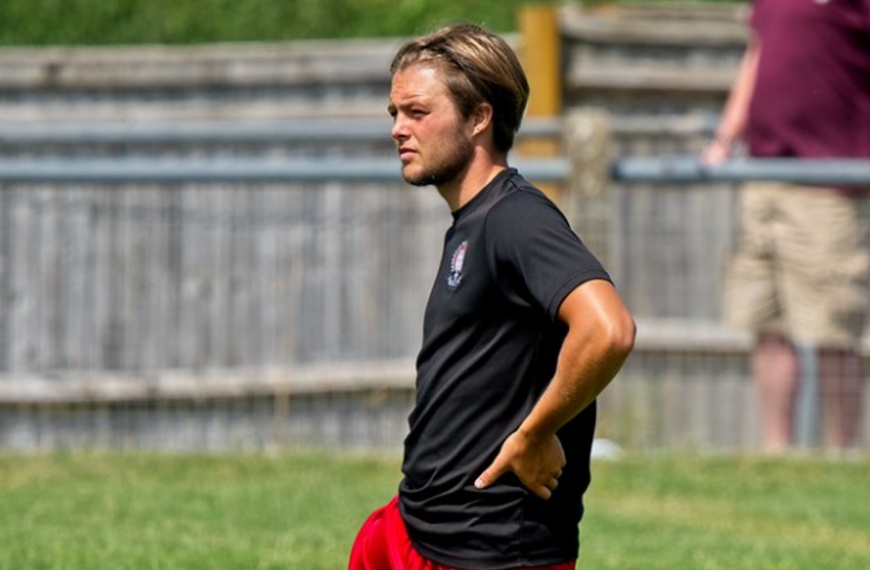 Alfie Loversidge warms up for Hassocks before a pre season friendly against Whitehawk