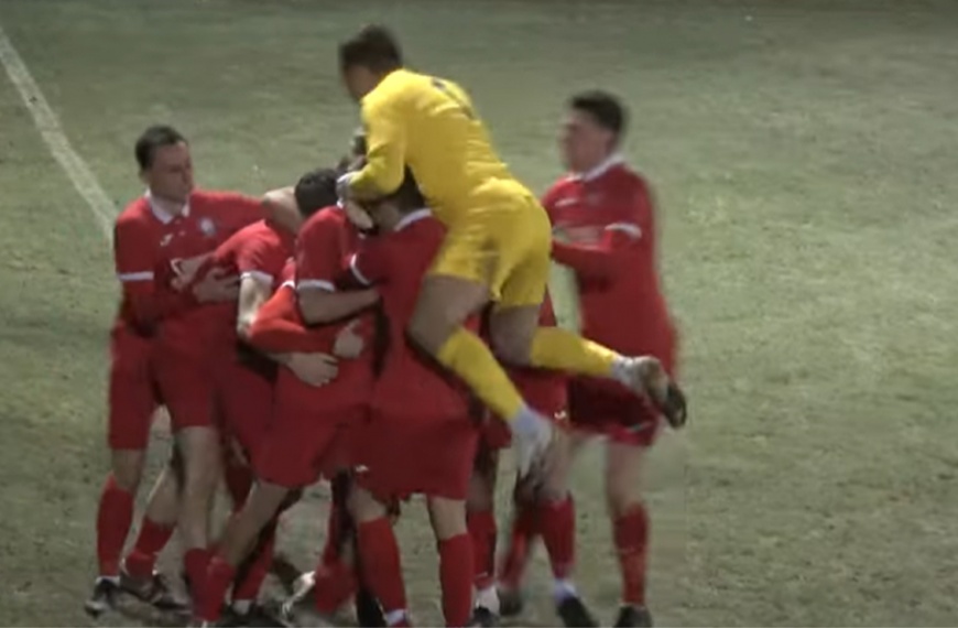 Hassocks players celebrate a last minute winner from Phil Johnson in a 2-1 win over Roffey