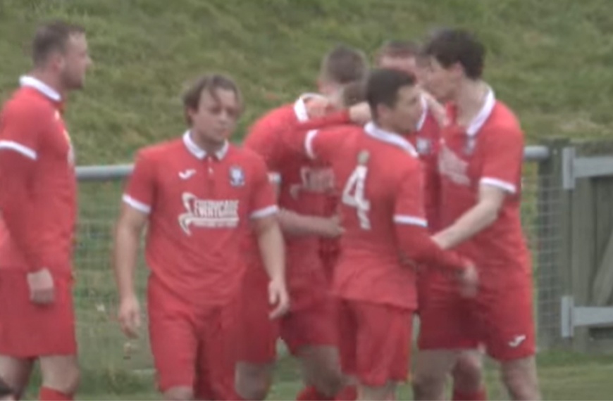 Hassocks players celebrate Alex Bygraves opening the scoring in their 2-0 win over Loxwood