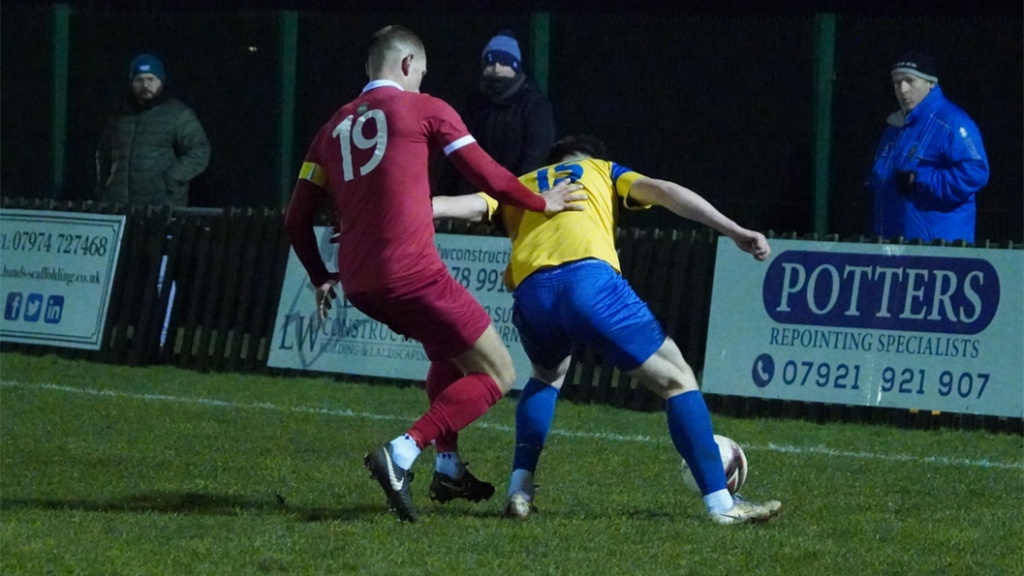 Hassocks captain Alex Bygraves playing against Eastbourne Town