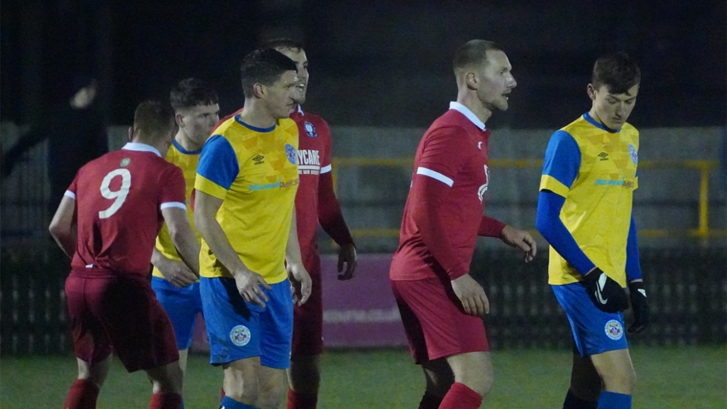 Hassocks defend a corner against Eastbourne Town