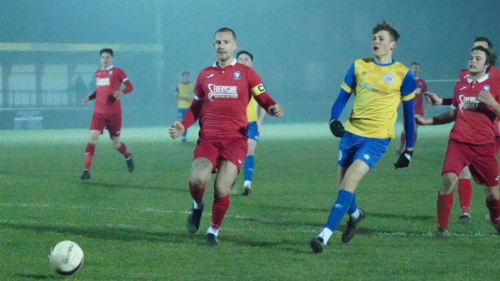 Alex Bygraves playing for Hassocks against Eastbourne Town