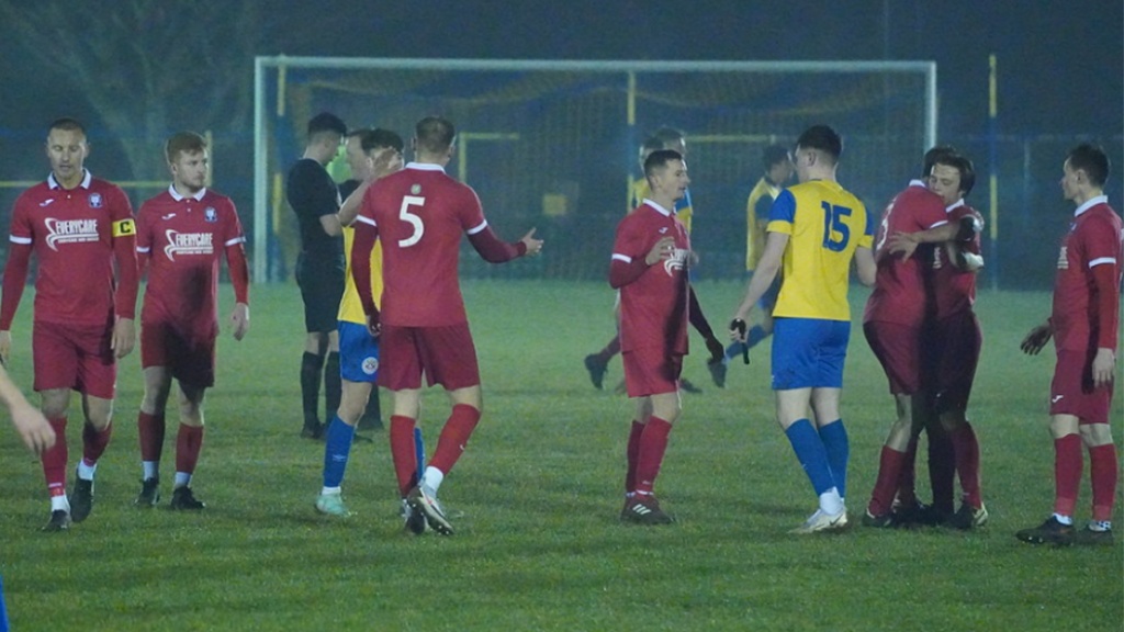 Hassocks celebrate their 1-0 win away at Eastbourne Town