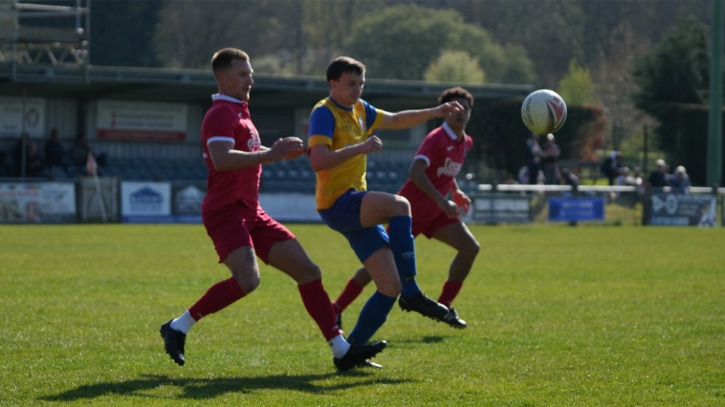 Alex Bygraves in action for Hassocks against Eastbourne Town