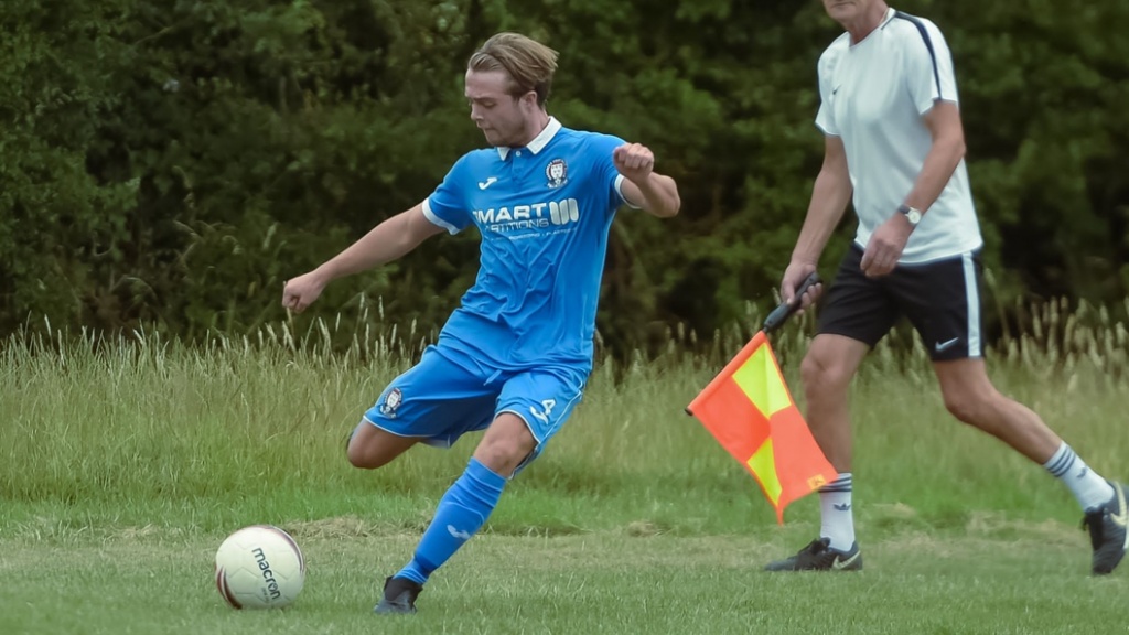 Hassocks midfielder Alfie Loversidge in action against Billingshurst
