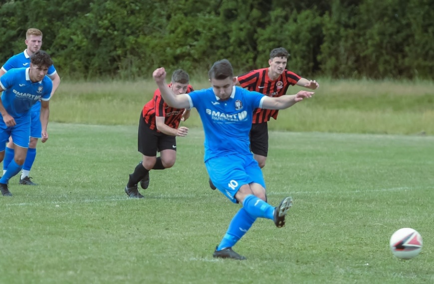 Kyle Woolven scores a penalty for Hassocks in a pre-season friendly at Billingshurst