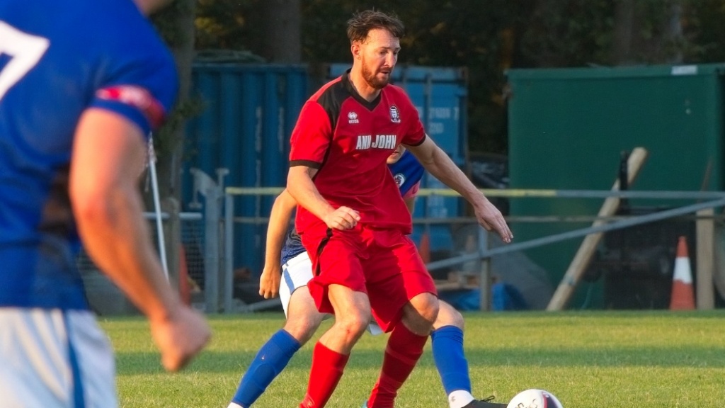 Ben Bacon on the ball for Hassocks