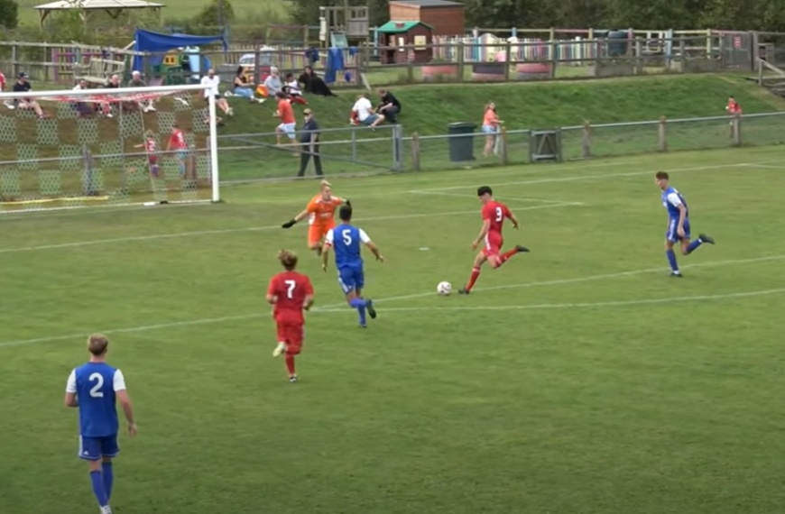 Liam Benson scores the fourth goal for Hassocks against AFC Varndeanians