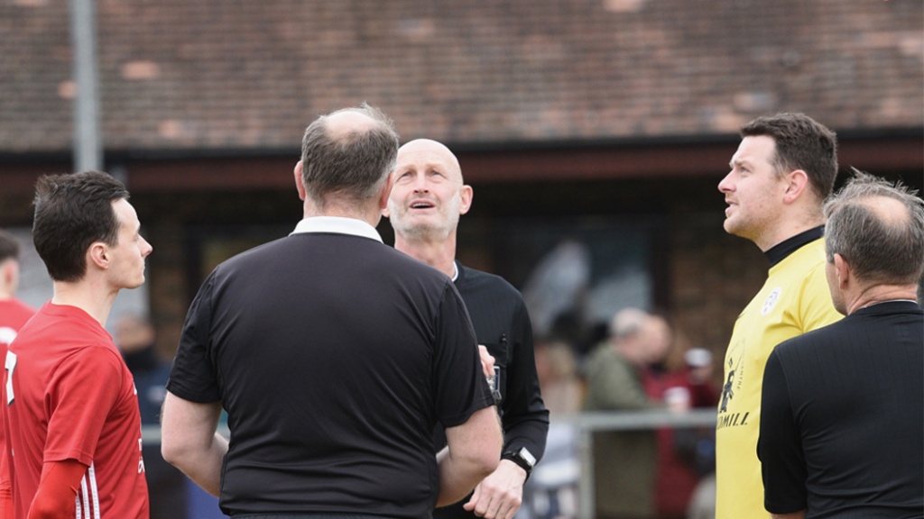 Hassocks captain Harvey Blake and Eastbourne United captain James Broadbent at the coin toss