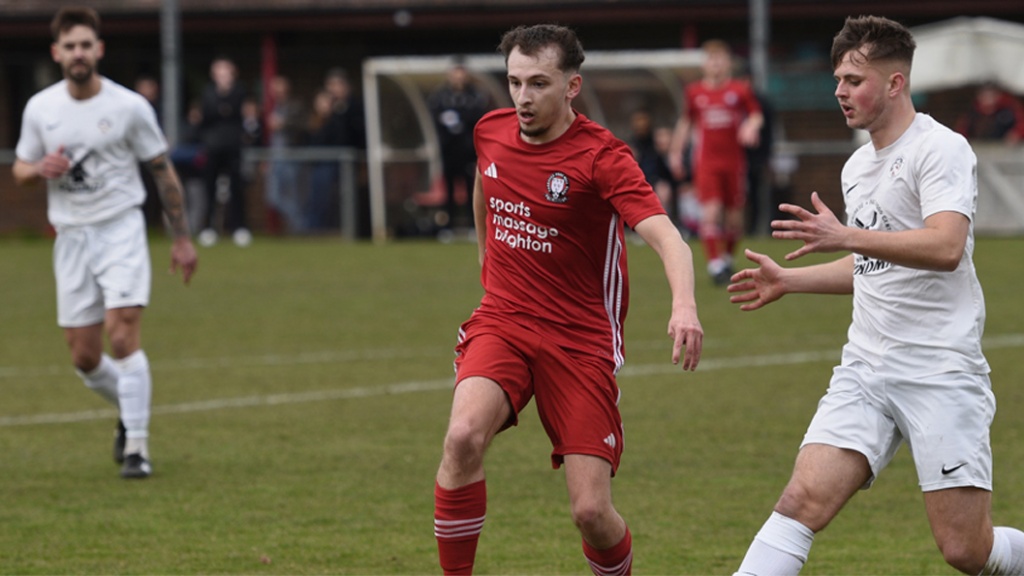 Sean Stephenson in action for Hassocks against Eastbourne United 