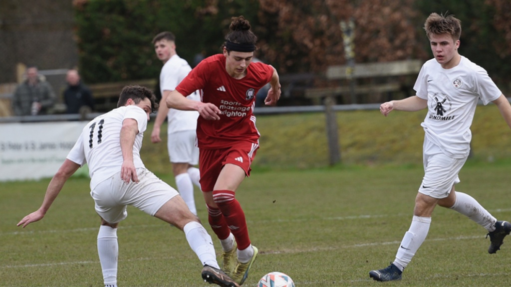 Faris Khalloqui in action for Hassocks against Eastbourne United