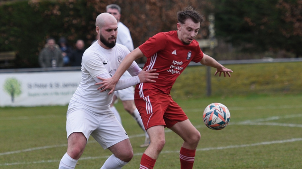 Sean Stephenson in action for Hassocks against Eastbourne United