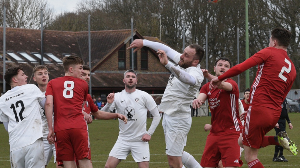 Hassocks attack from a corner against Eastbourne United