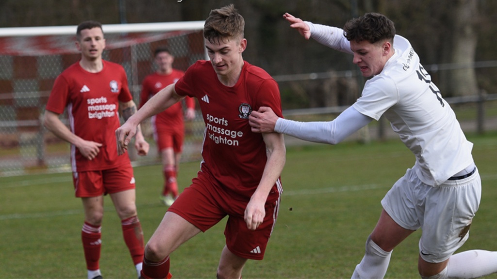 Jamie Wilkes in action for Hassocks against Eastbourne United