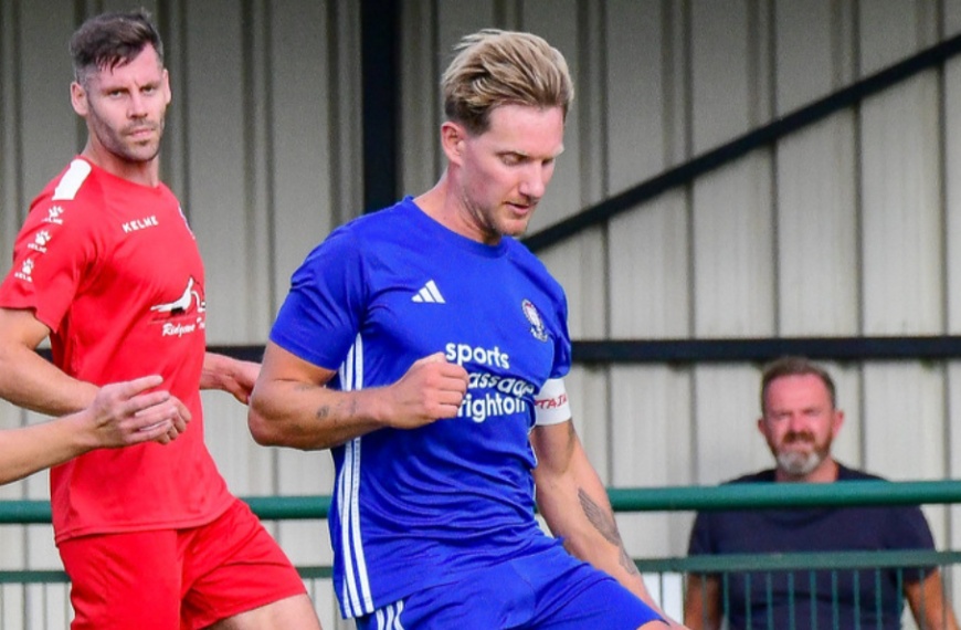 Alex Bygraves in action for Hassocks against Crawley Down Gatwick