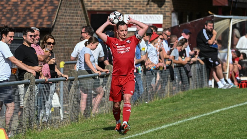 Harvey Blake in action for Hassocks against Saltdean United