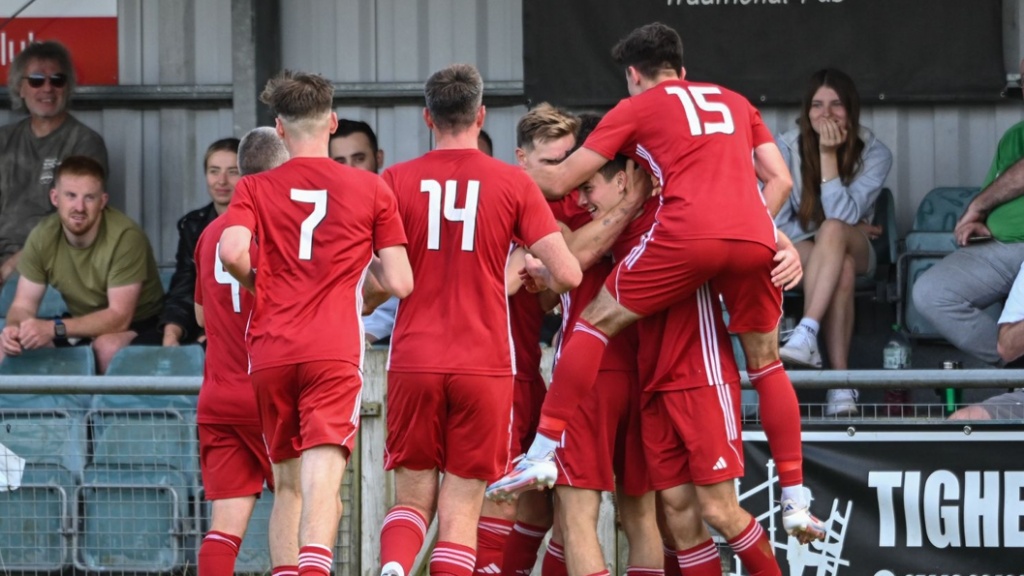 Hassocks celebrate Jack Troak scoring the winning goal against Saltdean United