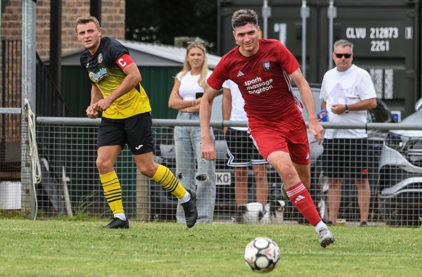 Hassocks striker Ruari Farrell in action against Wick