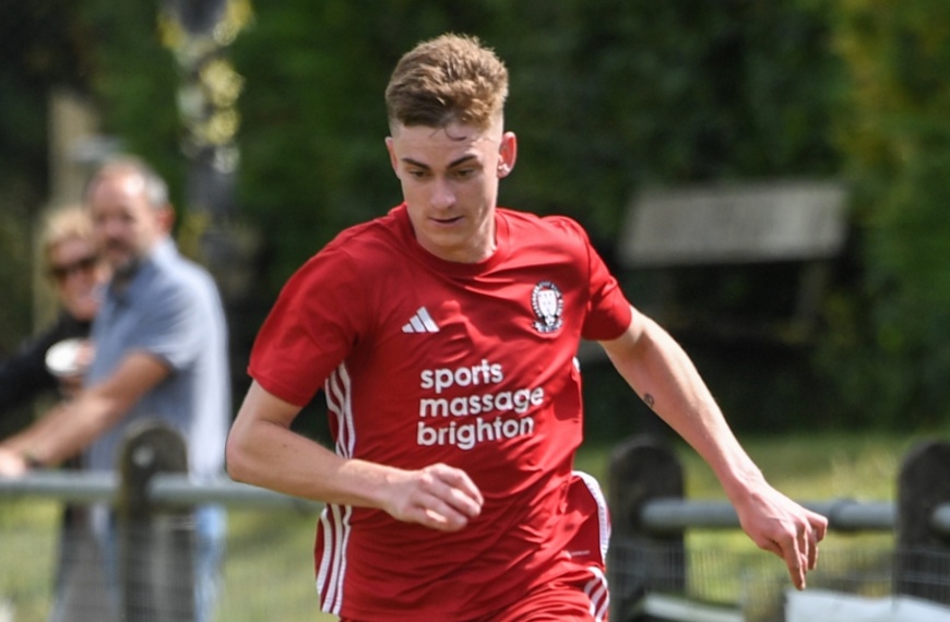 Jamie Wilkes in action for Hassocks against Crawley Down Gatwick